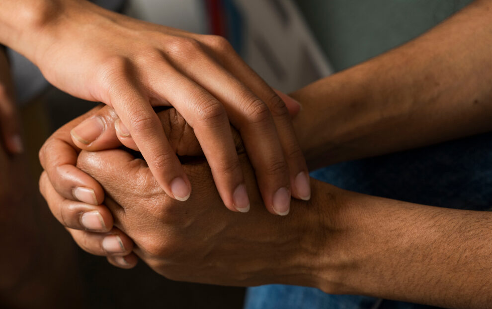 people holding hands